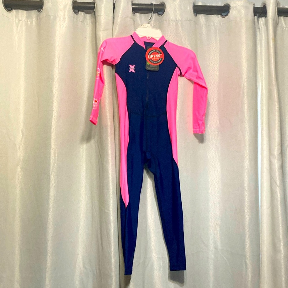 NWT rashguard with zipper for easy dressing! Nice stretchy nylon.Full length